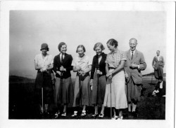 Old photo of people playing golf